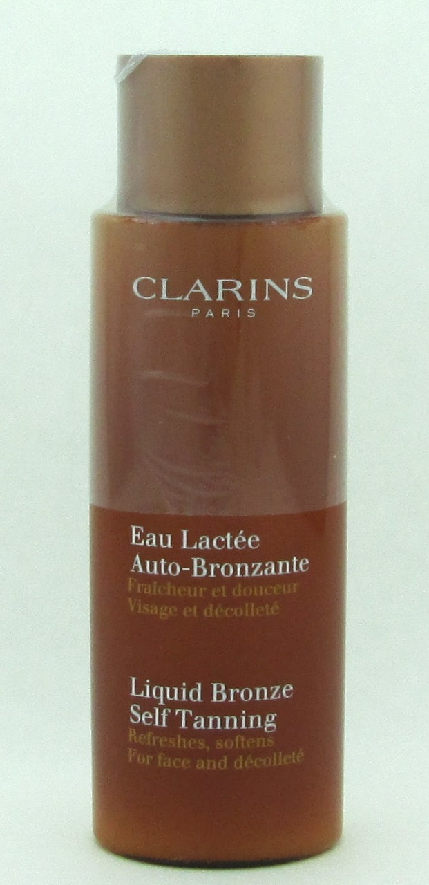 Clarins Liquid Bronze Self Tanning For Face & Decollete 4.2 oz. Boxed