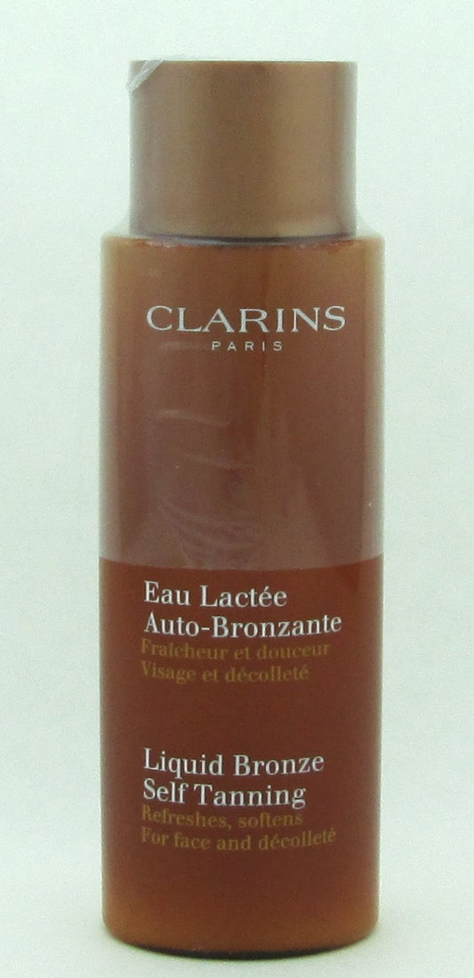 Clarins Liquid Bronze Self Tanning For Face & Decollete 4.2 oz. Boxed