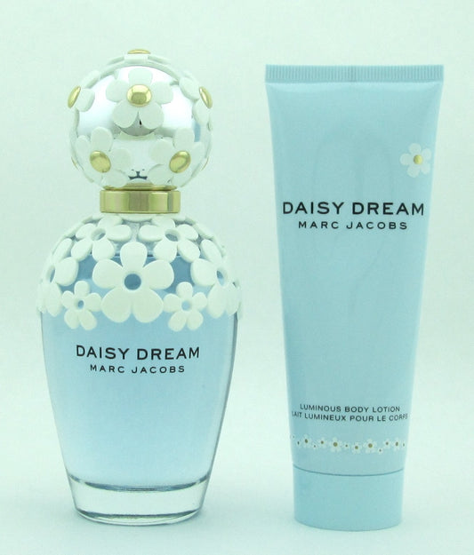 Daisy Dream by Marc Jacobs 2 pc Travel Set includes: EDT Spray 100 ml./ 3.4 oz. + Body Lotion 75 ml./ 2.5 oz. Damaged Box