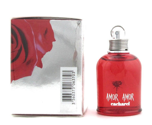 AMOR AMOR by Cacharel 1.7 oz. Eau de Toilette Spray New Slightly Damaged Box