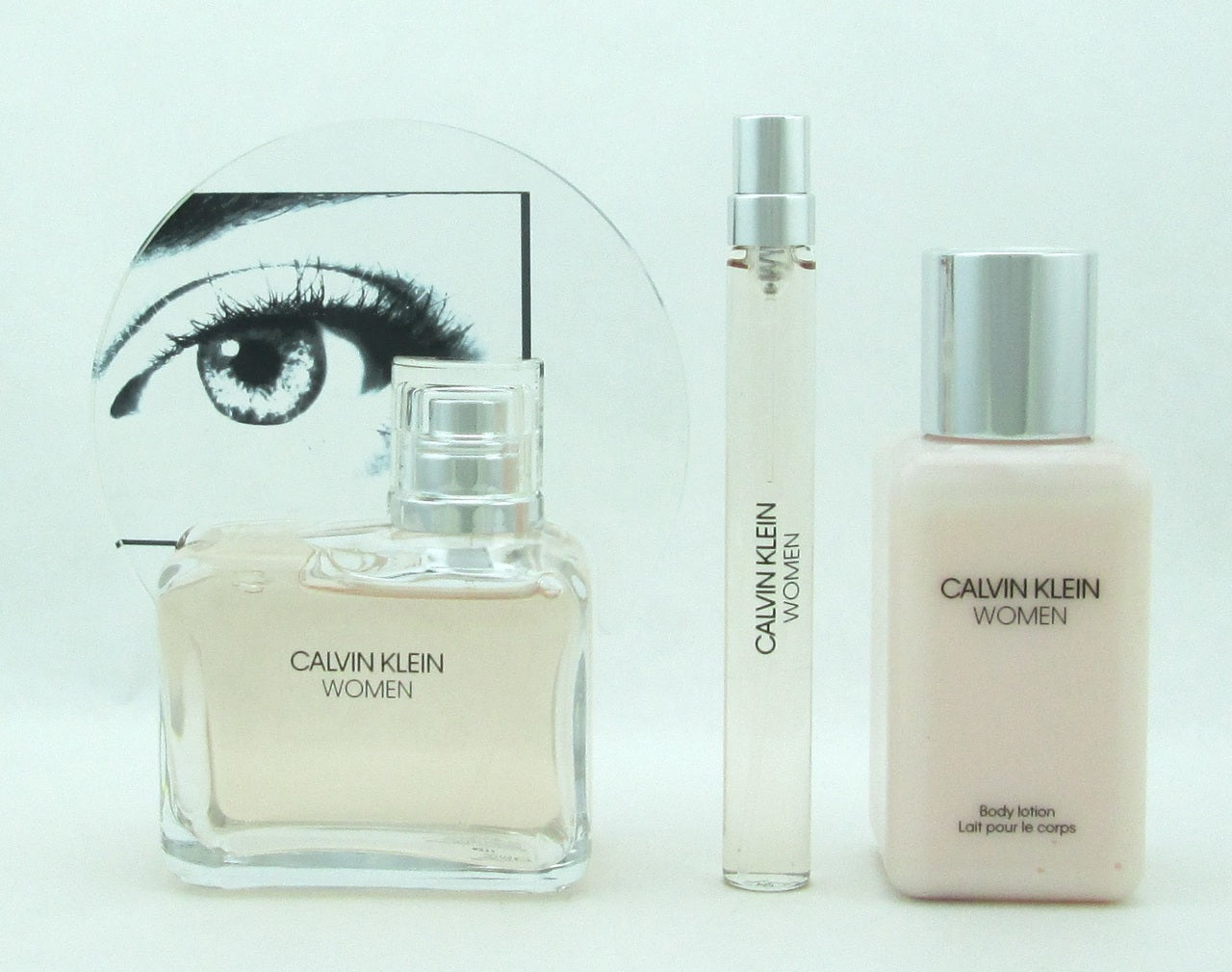 Calvin Klein WOMEN by Calvin Klein Set Includes: EDP Spray 3.4 oz./ 100 ml. + EDP Spray  0.33 oz./ 10 ml. + Body Lotion 3.4 oz./ 100 ml. New