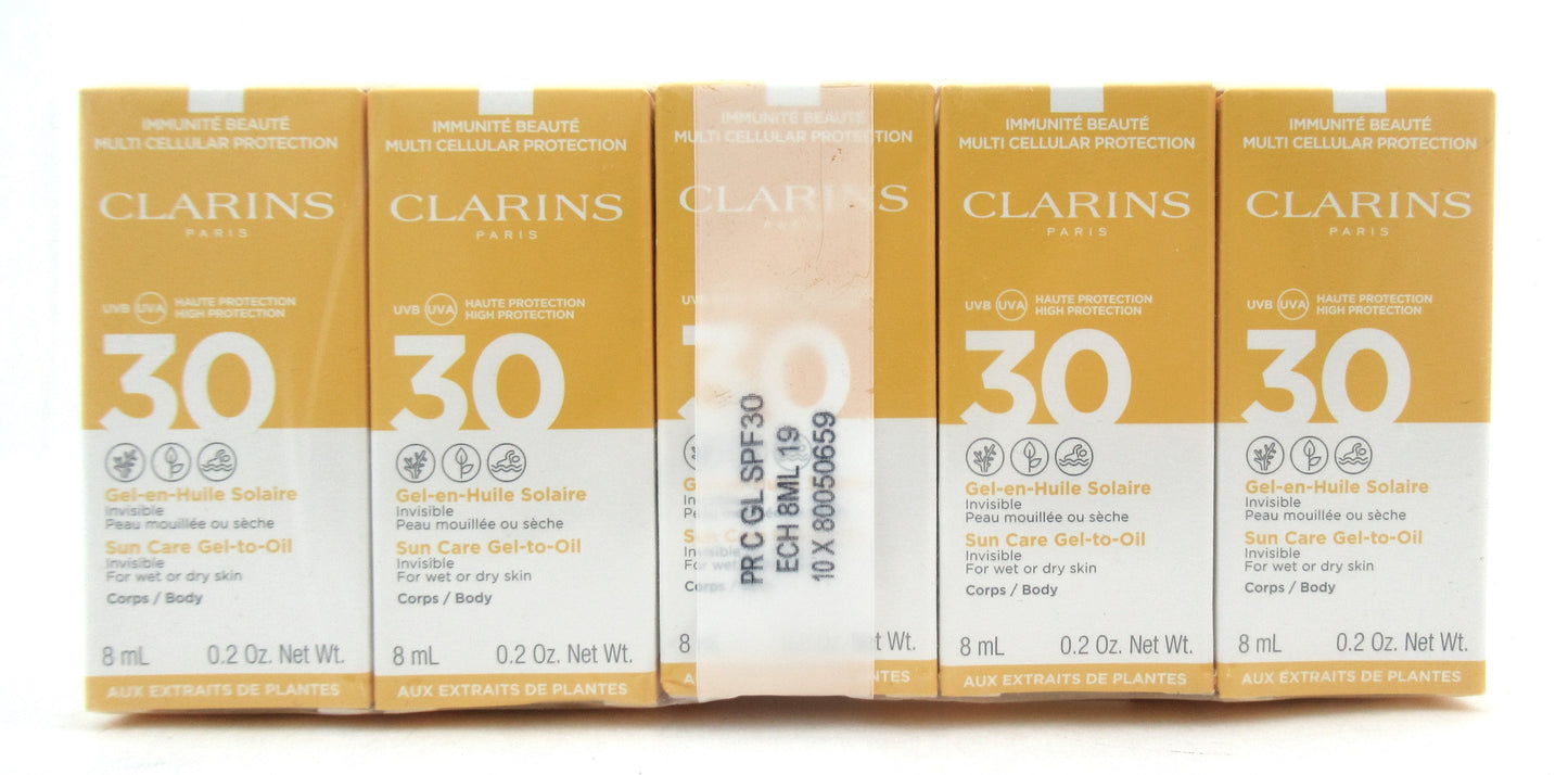 Clarins Sun Care Gel to Oil SPF 30 Invisible for wet or dry skin Body 8 ml./ 0.2 oz. Travel Size Lot of 10 Boxes