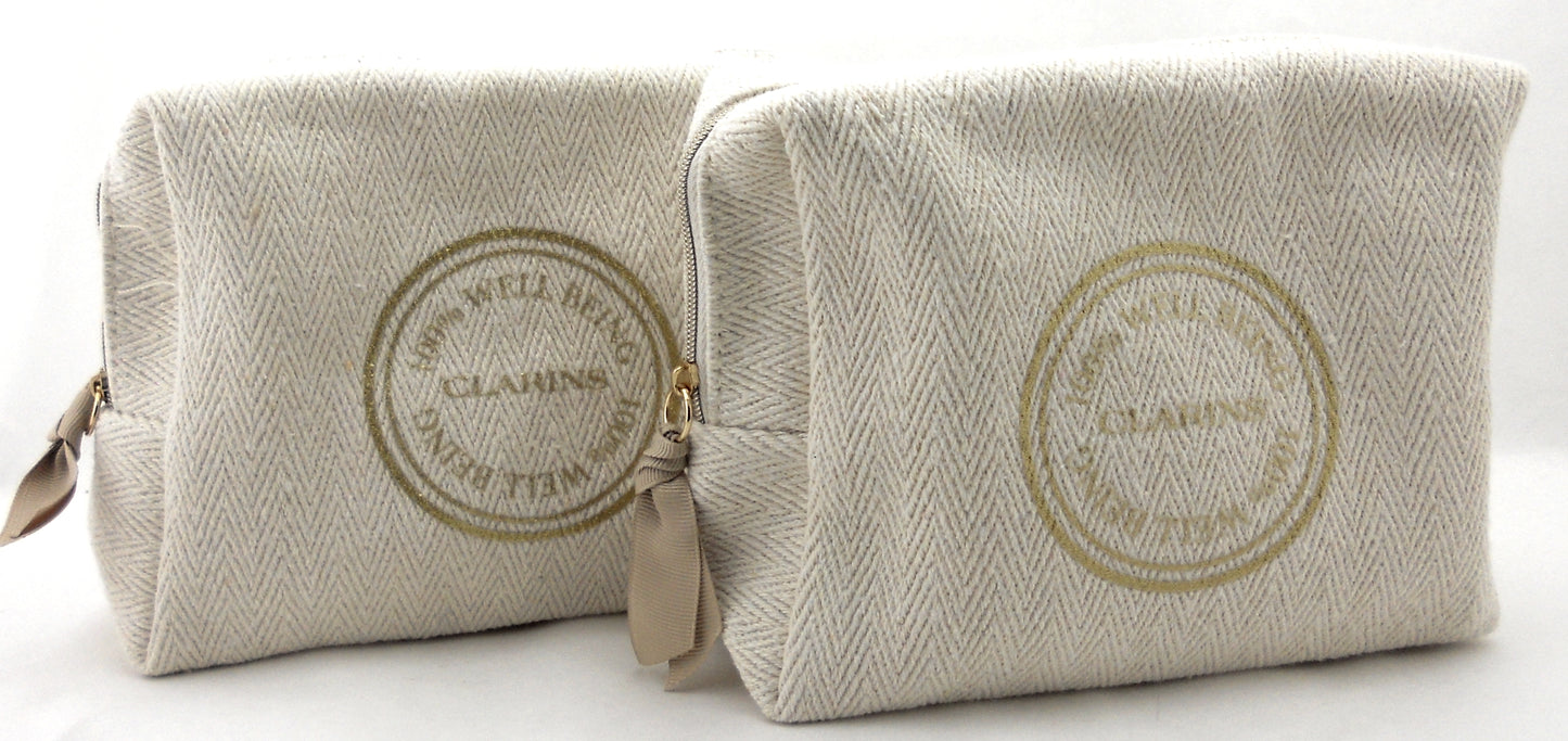 2 Clarins Cosmetic Fabric Bags 7 inch X 6  Brand new. Never used.